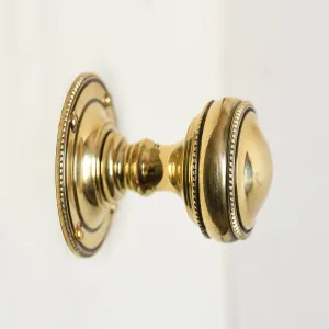 Brass Regency Beaded Edge Door Knobs