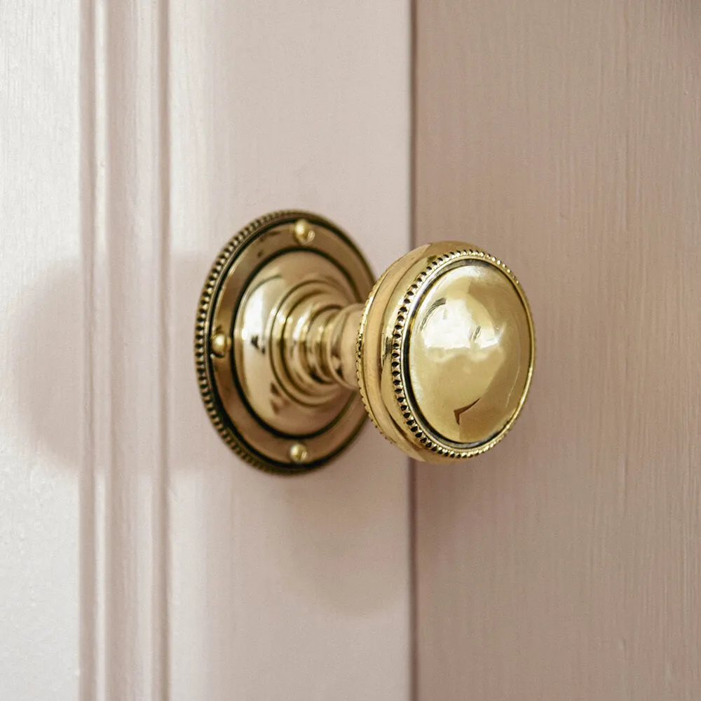 Brass Regency Beaded Edge Door Knobs