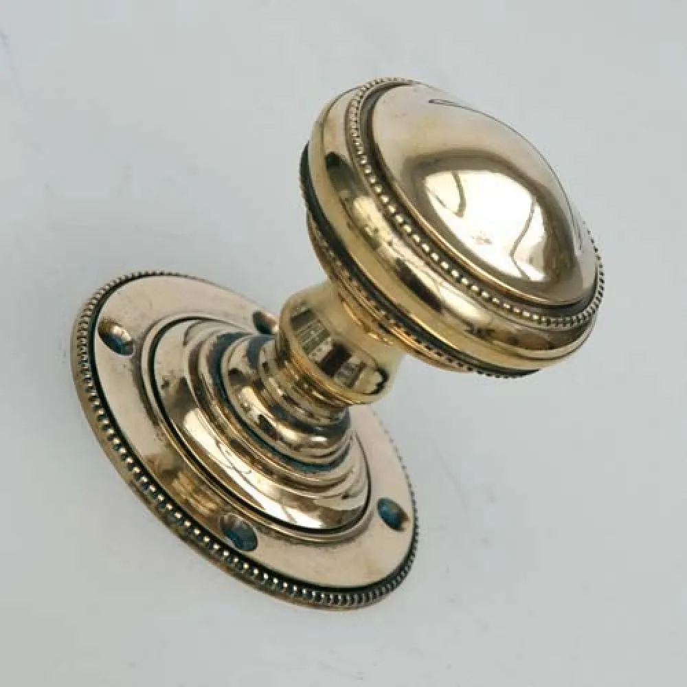 Brass Regency Beaded Edge Door Knobs