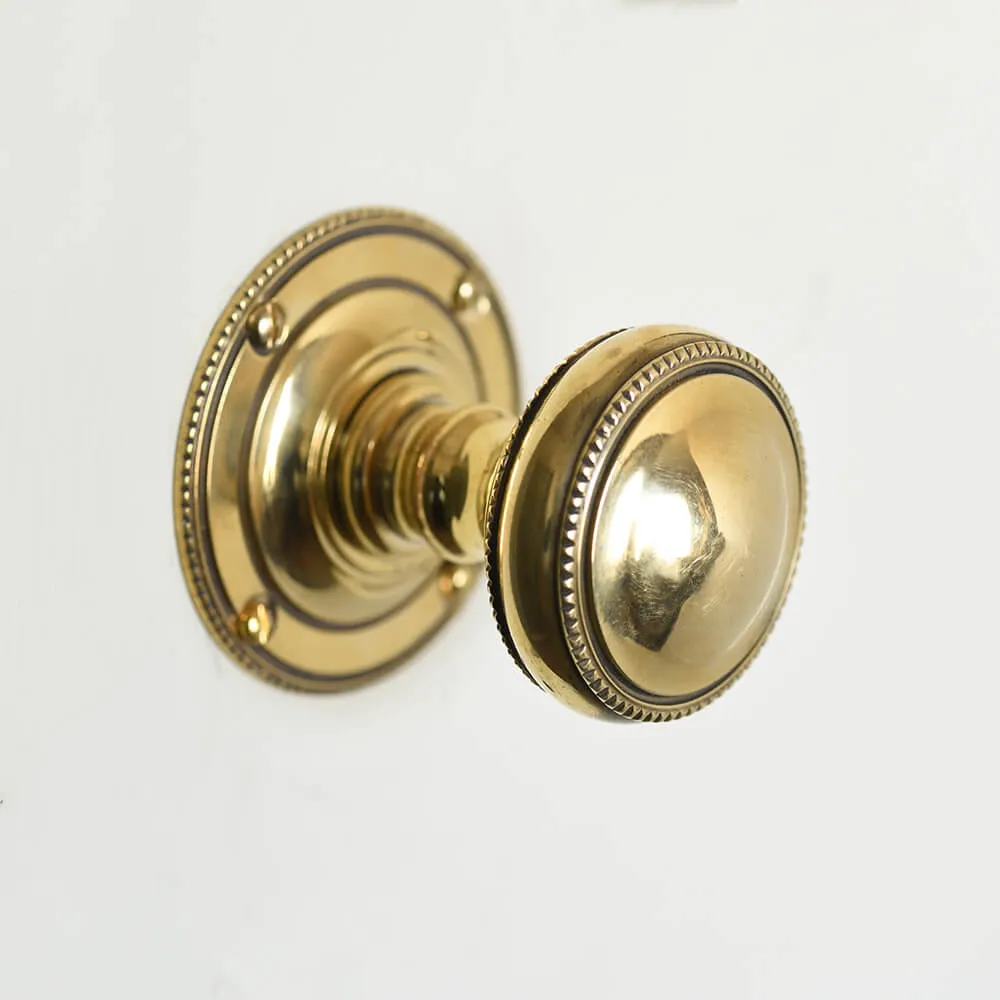 Brass Regency Beaded Edge Door Knobs
