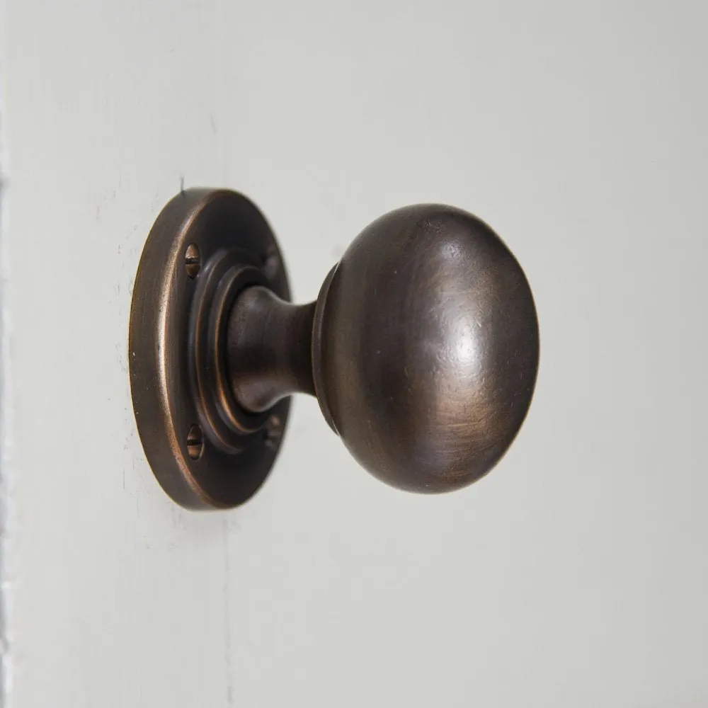 Distressed Antique Brass Large Bun Door Knobs