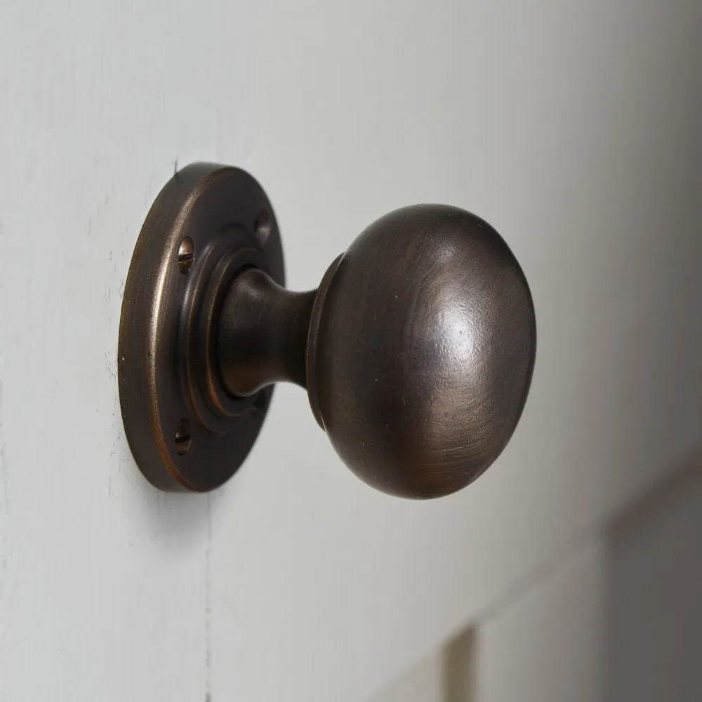 Distressed Antique Brass Large Bun Door Knobs