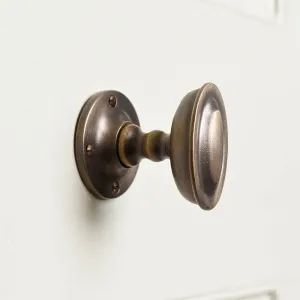 Distressed Antique Brass Oval Edwardian Door Knobs