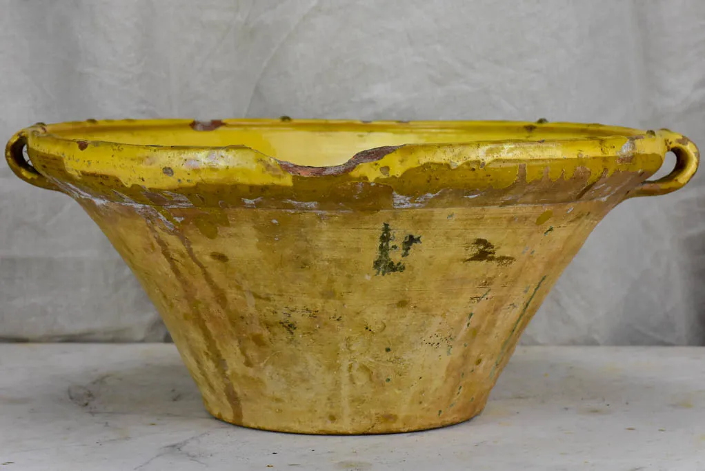 Late 19th Century French tian with yellow glaze