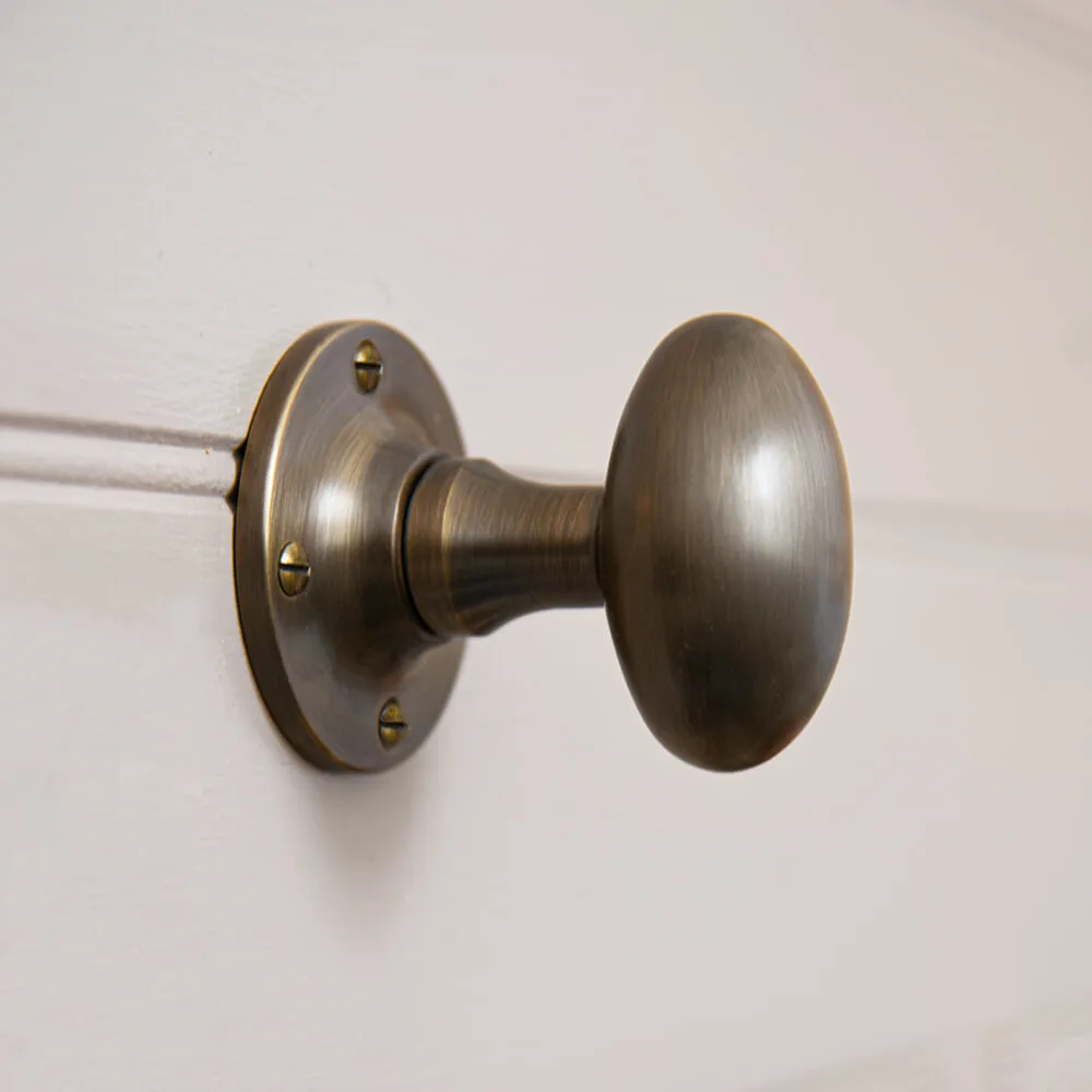 Light Antique Brass Oval Door Knobs