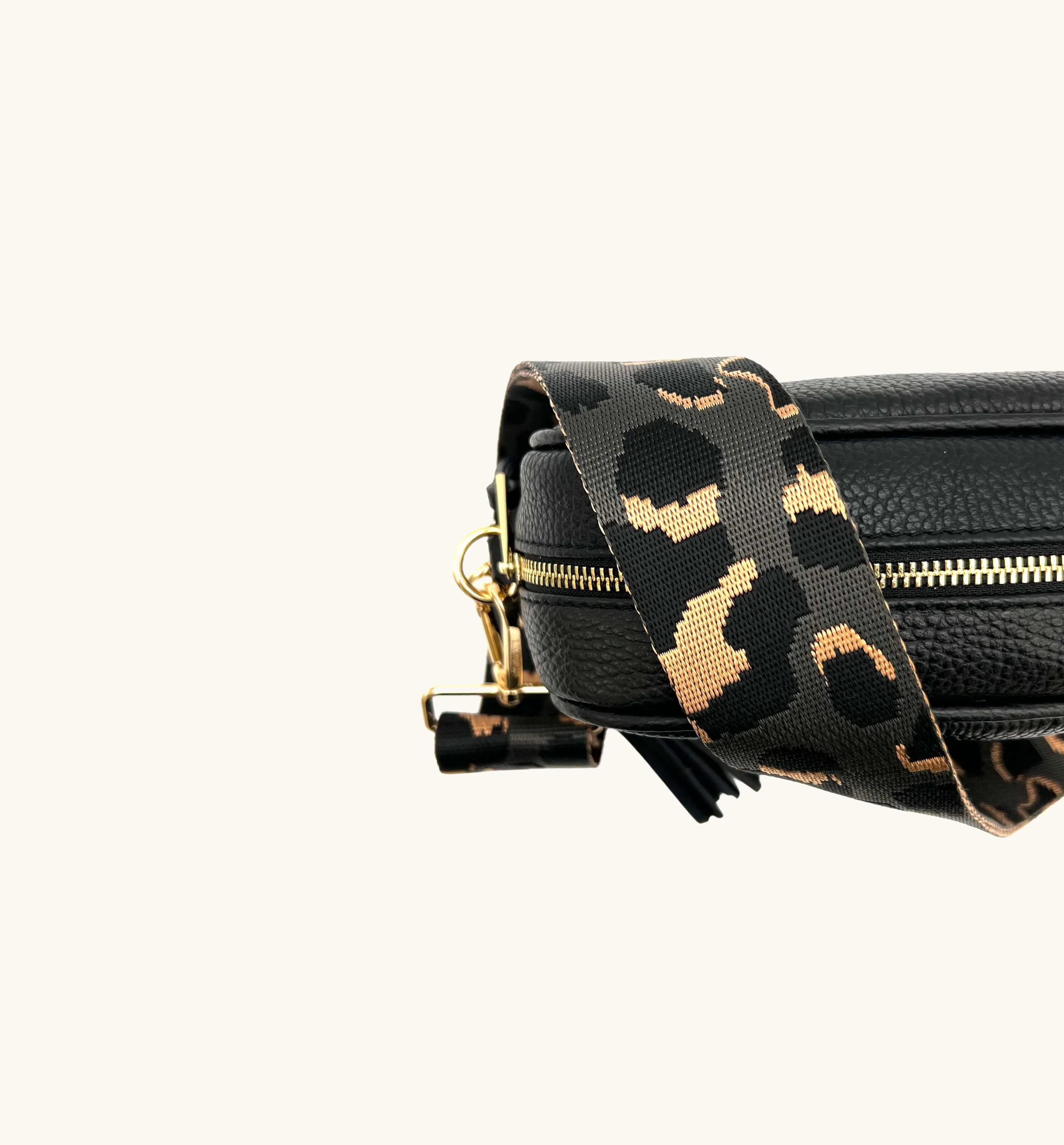 The Tassel Black Leather Crossbody Bag With Grey Leopard Strap